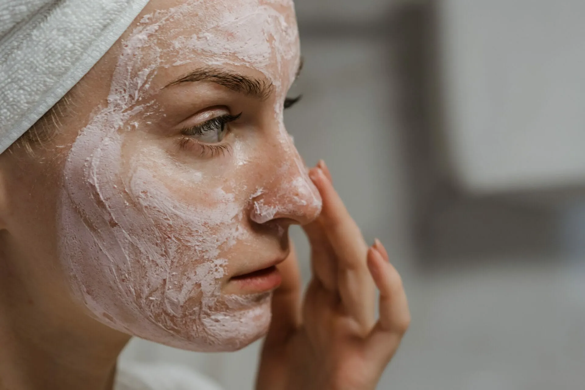 a girl scrubbing her face